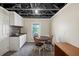 Small basement kitchenette and dining area at 775 Holcombe Woods Ct, Auburn, GA 30011