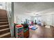 Finished basement with exercise equipment and play area at 775 Holcombe Woods Ct, Auburn, GA 30011