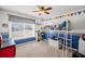 bedroom with race car theme and bunk bed at 775 Holcombe Woods Ct, Auburn, GA 30011