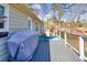 Deck with table, chairs, umbrella, and grill at 775 Holcombe Woods Ct, Auburn, GA 30011