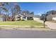 House exterior with well-maintained lawn and driveway at 775 Holcombe Woods Ct, Auburn, GA 30011