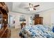 Main bedroom with king bed, wood furniture and access to bathroom at 775 Holcombe Woods Ct, Auburn, GA 30011