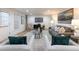 Bright basement recreation area featuring ample seating and large artwork at 2750 Olde Towne Pkwy, Duluth, GA 30097