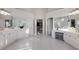 Large bathroom with double vanities, a view into the bedroom, and walk-in shower at 2750 Olde Towne Pkwy, Duluth, GA 30097