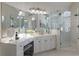 Elegant bathroom with double vanity, glass shower, and corner makeup vanity at 2750 Olde Towne Pkwy, Duluth, GA 30097