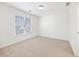 Bright bedroom with neutral walls and carpet at 2750 Olde Towne Pkwy, Duluth, GA 30097