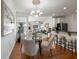 Formal dining room adjacent to the kitchen with a chandelier at 2750 Olde Towne Pkwy, Duluth, GA 30097