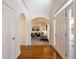Bright entryway with hardwood floors and view to living room at 2750 Olde Towne Pkwy, Duluth, GA 30097