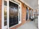 Elegant black front door with white trim and sidelights at 2750 Olde Towne Pkwy, Duluth, GA 30097