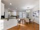 Eat-in kitchen with an island, hardwood floors, and updated appliances at 2750 Olde Towne Pkwy, Duluth, GA 30097
