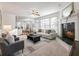 Spacious living room featuring a fireplace and an open floor plan at 2750 Olde Towne Pkwy, Duluth, GA 30097