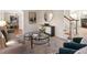 Spacious living room with ample natural light and comfortable furniture at 2750 Olde Towne Pkwy, Duluth, GA 30097