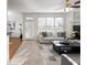 Living room with comfortable seating and access to the backyard at 2750 Olde Towne Pkwy, Duluth, GA 30097