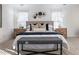 Main bedroom with cozy bedding and stylish nightstands at 2750 Olde Towne Pkwy, Duluth, GA 30097