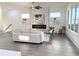 Inviting living room with modern fireplace and lots of natural light at 503 Glendale Rd, Scottdale, GA 30079