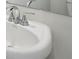 Close-up of a clean white bathroom sink with a modern chrome faucet at 2024 Avalon Rdg, Conyers, GA 30013