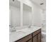 Bathroom featuring double sinks, modern fixtures, and a toilet at 2024 Avalon Rdg, Conyers, GA 30013