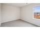 Bedroom with carpet, one window, and neutral walls at 2024 Avalon Rdg, Conyers, GA 30013
