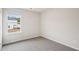 Bedroom with carpet, one window, and neutral walls at 2024 Avalon Rdg, Conyers, GA 30013
