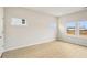 Bright and airy bedroom with sleek floors and abundant natural light from three windows at 2024 Avalon Rdg, Conyers, GA 30013