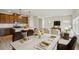 Open-concept dining area connected to the kitchen and living room, perfect for Gathering gatherings at 2024 Avalon Rdg, Conyers, GA 30013
