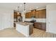 Kitchen showcasing stylish cabinets, stainless steel appliances, a center island, and subway tile backsplash at 2024 Avalon Rdg, Conyers, GA 30013