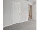 Bedroom featuring neutral walls and carpeting, with natural light streaming through the doorways at 2026 Avalon Rdg, Conyers, GA 30013