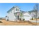 Attractive two-story home featuring white siding, black shutters, and a well-kept lawn at 2026 Avalon Rdg, Conyers, GA 30013