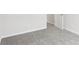 Bedroom features gray carpet, neutral walls and a white door at 2028 Avalon Rdg, Conyers, GA 30013