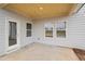 View of the back patio and backyard at 2032 Avalon Rdg, Conyers, GA 30013