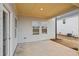View of the backyard patio and vinyl siding at 2032 Avalon Rdg, Conyers, GA 30013