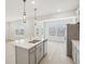 Bright, modern kitchen with a stainless steel dishwasher at 2032 Avalon Rdg, Conyers, GA 30013