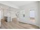 Bright kitchen with an island, stainless steel appliances, and hardwood floors at 2032 Avalon Rdg, Conyers, GA 30013
