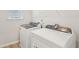 Bright laundry room features a new washer and dryer set at 2032 Avalon Rdg, Conyers, GA 30013
