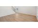 Living room showcasing light walls, wood flooring and a white base trim at 2032 Avalon Rdg, Conyers, GA 30013