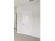 An interior shot of a bedroom with carpeted floors and white walls at 2036 Avalon Rdg, Conyers, GA 30013