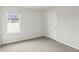 Bright bedroom with carpet, white walls and doors, and natural light at 2036 Avalon Rdg, Conyers, GA 30013