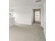 A bonus room with gray carpet, white walls and a window at 2036 Avalon Rdg, Conyers, GA 30013