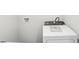 Picture of a white dryer in a bright laundry room at 2038 Avalon Rdg, Conyers, GA 30013