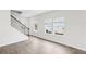 Spacious living room featuring hardwood floors and bright windows at 2038 Avalon Rdg, Conyers, GA 30013