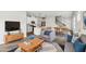 Cozy living room featuring kitchen, dining area, and hardwood floors at 2038 Avalon Rdg, Conyers, GA 30013