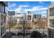 Stunning aerial view of the city with tree lined street at 1301 Peachtree # 3B, Atlanta, GA 30309