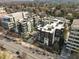 Aerial view of modern luxury apartment building with city views and landscaped grounds at 1301 Peachtree # 3B, Atlanta, GA 30309