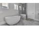 Spa-like bathroom with a large soaking tub and walk-in shower at 1301 Peachtree # 3B, Atlanta, GA 30309