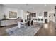 Elegant dining area with modern chandelier and hardwood floors at 1301 Peachtree # 3B, Atlanta, GA 30309