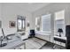 Bright home office with a large desk and comfortable chair at 1301 Peachtree # 3B, Atlanta, GA 30309