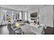Open living area with fireplace, large windows, and ample seating at 1301 Peachtree # 3B, Atlanta, GA 30309