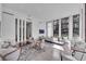 Elegant lobby with modern furniture and large windows at 1301 Peachtree # 3B, Atlanta, GA 30309