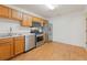 Kitchen with stainless steel appliances and wood cabinets at 1920 Kolb Farm Sw Cir, Marietta, GA 30008