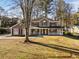 Two-story house with a large yard and driveway at 2192 Smokehouse Path, Lawrenceville, GA 30044